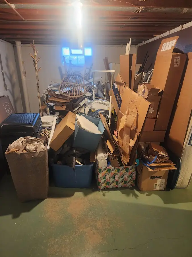 Roll-off dumpster container at job site for Yard Waste Dumpster Rental in Melody Hill